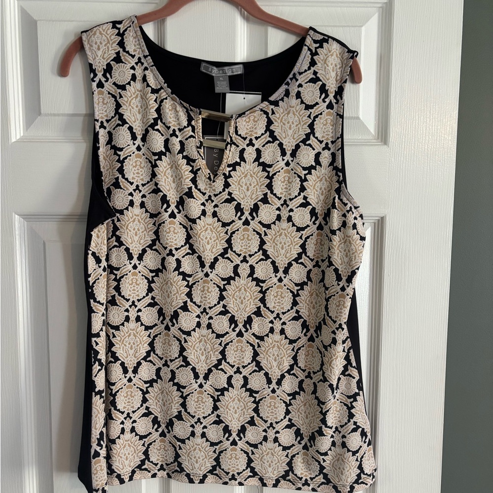 Chic Black and Cream Sleeveless Blouse